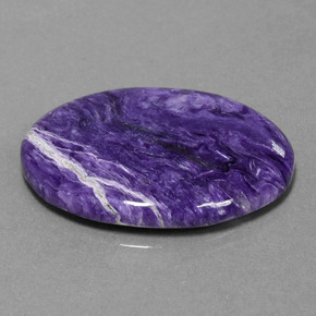 Charoíta violeta natural 23,27ct, corte oval, opaco