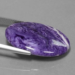 Charoíta violeta natural 23,27ct, corte oval, opaco
