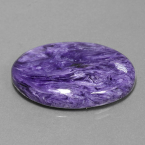 Charoíta violeta natural 30,97ct, corte oval, opaco