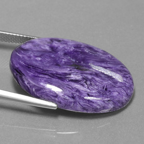 Charoíta violeta natural 30,97ct, corte oval, opaco