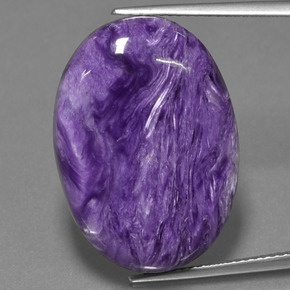 Charoíta violeta natural 22,78ct, corte oval, opaco
