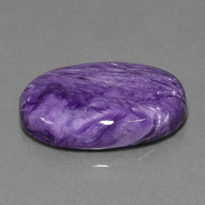 Charoíta violeta natural 22,78ct, corte oval, opaco
