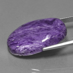 Charoíta violeta natural 22,78ct, corte oval, opaco