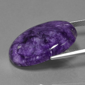 Charoíta violeta natural 18,97ct, corte oval, opaco