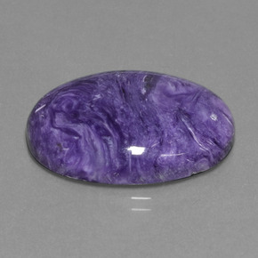 Charoíta violeta natural 20,31ct, corte oval, opaco