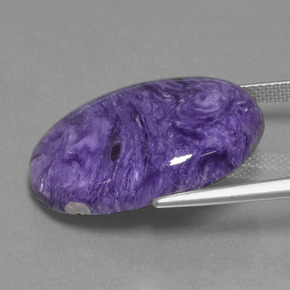 Charoíta violeta natural 20,31ct, corte oval, opaco