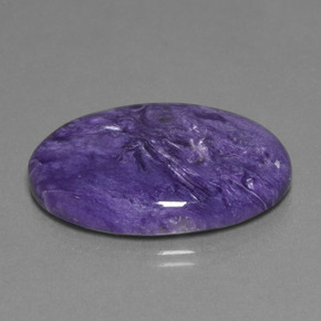 Charoíta violeta natural 30,48ct, corte oval, opaco