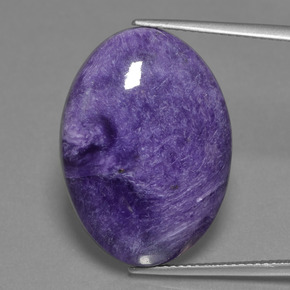 Charoíta violeta natural 20,32ct, corte oval, opaco