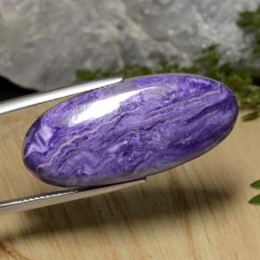 Charoíta violeta natural 27,33ct, corte oval, opaco