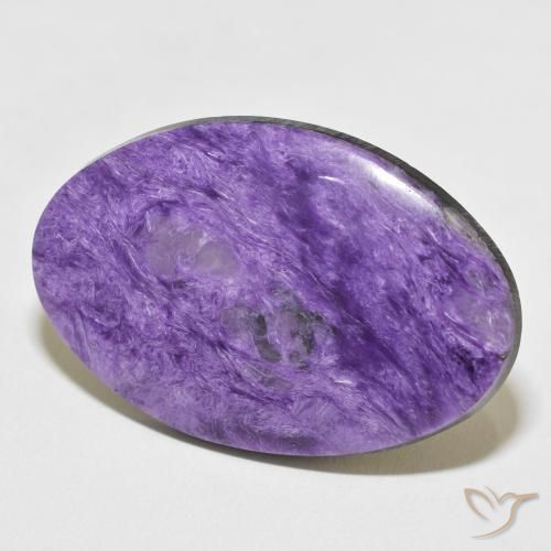Charoíta violeta natural 38,87ct, corte oval, opaco