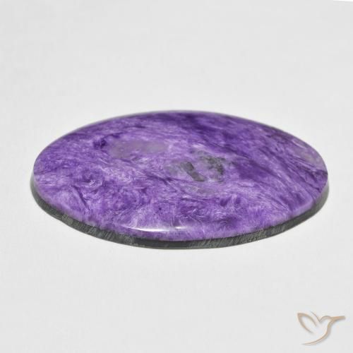 Charoíta violeta natural 38,87ct, corte oval, opaco