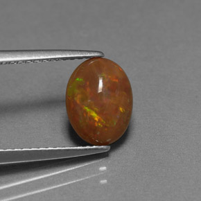 Opala chocolate multicolorido natural 0,83ct, corte oval, opaco