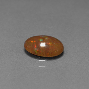 Opala chocolate multicolorido natural 0,83ct, corte oval, opaco