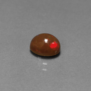 Opala chocolate multicolorido natural 0,77ct, corte oval, opaco