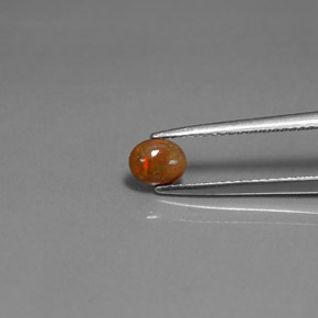 Opala chocolate multicolorido natural 0,34ct, corte oval, opaco