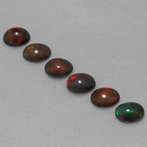 Pedras preciosas de opala chocolate multicolorido natural de 4,61 ct, corte oval, translúcido