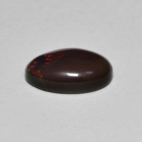 Opala chocolate multicolorido natural 0,80ct, corte oval, translúcido