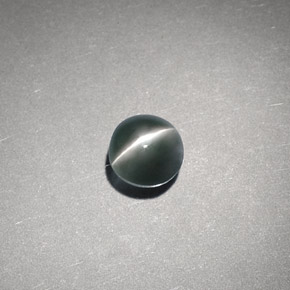 Chrysoberyl cat's eye verde natural 0,65ct, corte redondo, translúcido