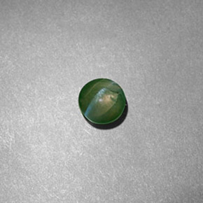 Chrysoberyl cat's eye verde natural 0,60ct, corte redondo, translúcido