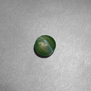 Chrysoberyl cat's eye verde natural 0,60ct, corte redondo, translúcido