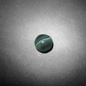 Chrysoberyl cat's eye verde natural 0,62ct, corte redondo, translúcido