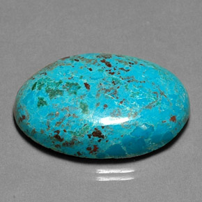 Crisocola multicolorido natural 26,90ct, corte oval, opaco