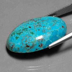 Crisocola multicolorido natural 26,90ct, corte oval, opaco