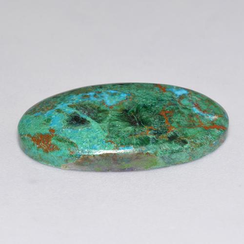 Crisocola multicolorido natural 9,75ct, corte oval, opaco