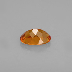 Clinohumita Amarelo alaranjado Natural 0.48ct, Corte Oval, VS