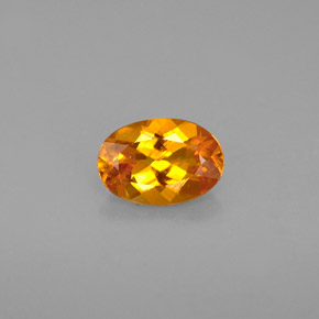 Clinohumita laranja natural 0,67ct, corte oval, VS