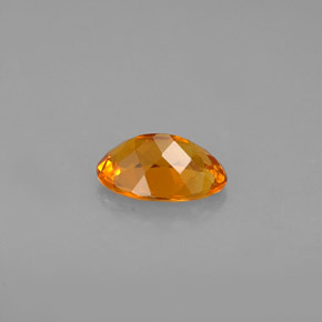 Clinohumita laranja natural 0,67ct, corte oval, VS