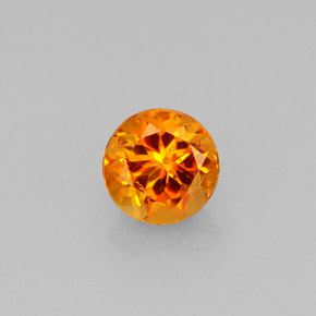 Clinohumita laranja natural 0,64ct, corte redondo, VS