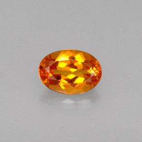 Clinohumita Amarelo alaranjado Natural 0.56ct, Corte Oval, VS