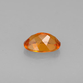Clinohumita Amarelo alaranjado Natural 0.56ct, Corte Oval, VS