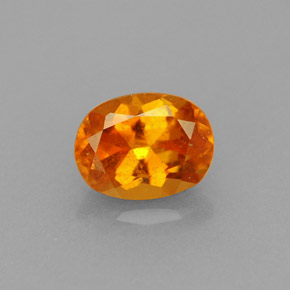 Clinohumita laranja natural 0,75ct, corte oval, VS