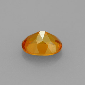 Clinohumita laranja natural 0,75ct, corte oval, VS