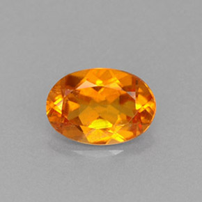Clinohumita Amarelo alaranjado Natural 0.66ct, Corte Oval, VS-SI