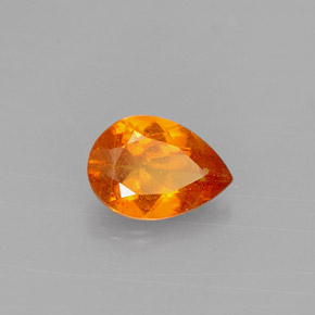 Clinohumita laranja natural 0,57ct, formato de pêra, VS-SI