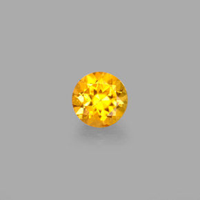 Clinohumita amarelo natural 0,40ct, corte redondo, VS-SI