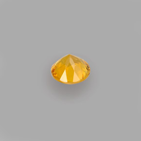 Clinohumita amarelo natural 0,40ct, corte redondo, VS-SI