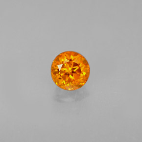 Clinohumita laranja natural 0,43ct, corte redondo, VS