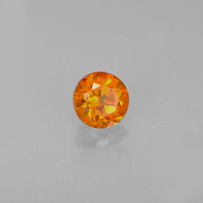 Clinohumita laranja natural 0,43ct, corte redondo, VS