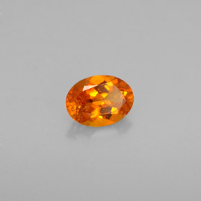 Clinohumita laranja natural 0,50ct, corte oval, VS
