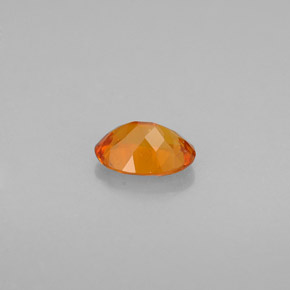 Clinohumita laranja natural 0,50ct, corte oval, VS