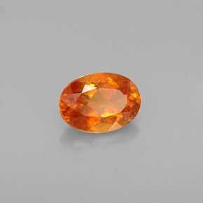 Clinohumita Amarelo alaranjado Natural 0.64ct, Corte Oval, VS-SI