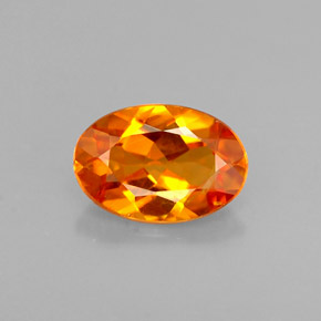 Clinohumita laranja natural 0,58ct, corte oval, VS
