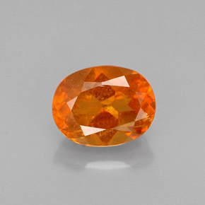 Clinohumita laranja natural 0,72ct, corte oval, VS-SI