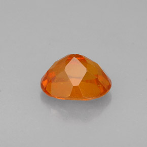 Clinohumita laranja natural 0,72ct, corte oval, VS-SI