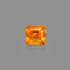Clinohumita laranja natural 0,69ct, corte esmeralda, VS-SI
