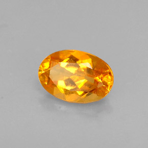 Clinohumita laranja natural 0,52ct, corte oval, VS